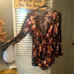 Papermoon Romper with embroidered sleeves.